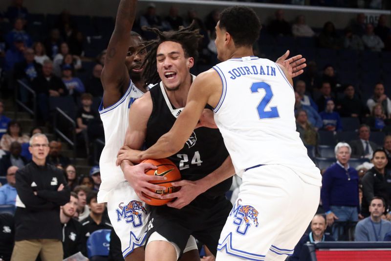 Jan 31, 2024; Memphis, Tennessee, USA; Rice Owls forward Keanu Dawes (24) drives to the basket between Memphis Tigers forward David Jones (8) and Memphis Tigers forward Nicholas Jourdain (2) during the second half at FedExForum. Mandatory Credit: Petre Thomas-USA TODAY Sports