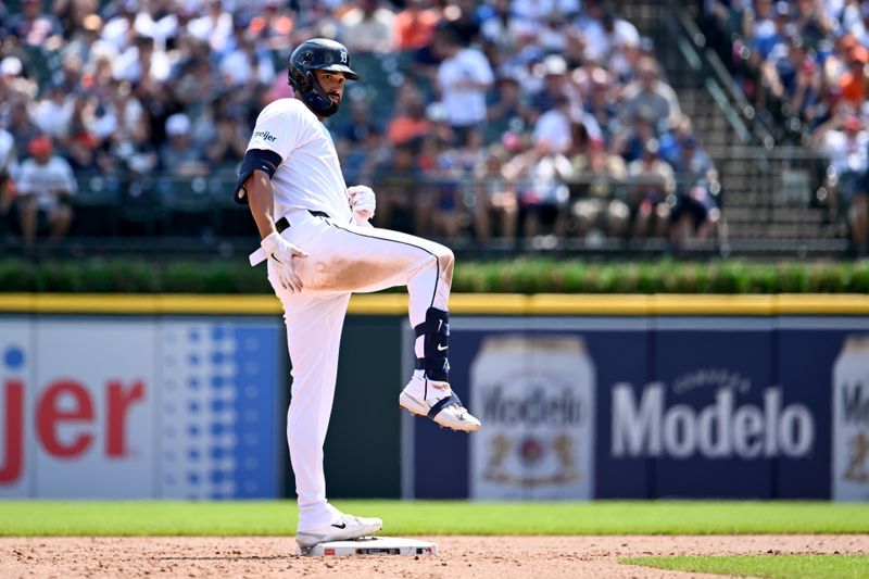 Jul 13, 2024; Detroit, Michigan, USA; Detroit Tigers center fielder Riley Greene (31) celebrates after hitting a double against the Los Angeles Dodgers in the seventh inning at Comerica Park. Mandatory Credit: Lon Horwedel-USA TODAY Sports