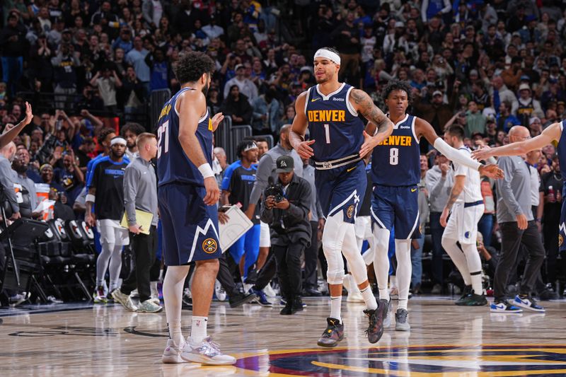 DENVER, CO - NOVEMBER 10: Michael Porter Jr. #1 of the Denver Nuggets celebrates scoring the game winning basket during the game against the Dallas Mavericks on November 10, 2024 at Ball Arena in Denver, Colorado. NOTE TO USER: User expressly acknowledges and agrees that, by downloading and/or using this Photograph, user is consenting to the terms and conditions of the Getty Images License Agreement. Mandatory Copyright Notice: Copyright 2024 NBAE (Photo by Garrett Ellwood/NBAE via Getty Images)