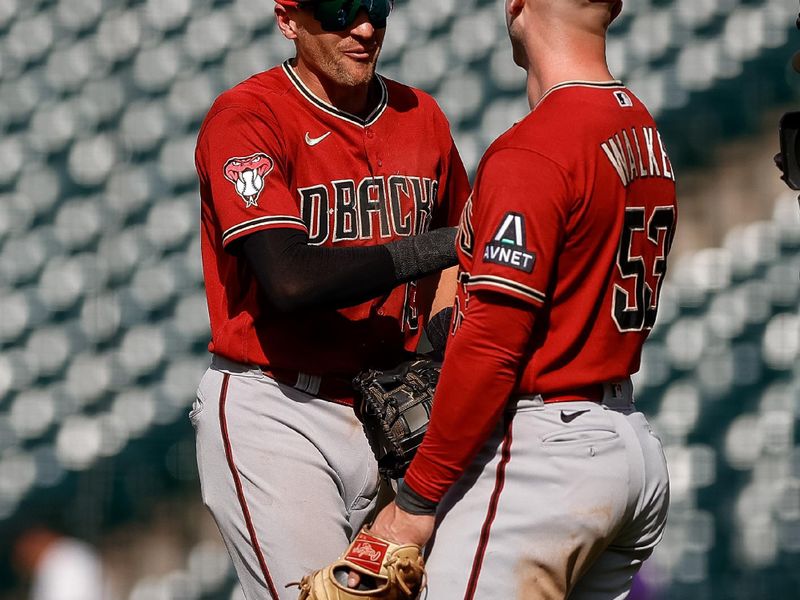 Aug 16, 2023; Denver, Colorado, USA; Arizona Diamondbacks shortstop Nick Ahmed (13) celebrates with first baseman Christian Walker (53) after the game against the Colorado Rockies at Coors Field. Mandatory Credit: Isaiah J. Downing-USA TODAY Sports