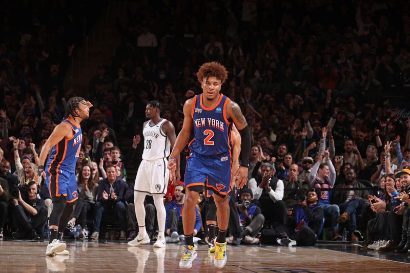 NEW YORK, NY - MARCH 23: Miles McBride #2 of the New York Knicks celebrates three point basket during the game against the Brooklyn Nets on March 23, 2024 at Madison Square Garden in New York City, New York.  NOTE TO USER: User expressly acknowledges and agrees that, by downloading and or using this photograph, User is consenting to the terms and conditions of the Getty Images License Agreement. Mandatory Copyright Notice: Copyright 2024 NBAE  (Photo by Nathaniel S. Butler/NBAE via Getty Images)