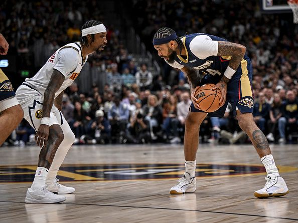 DENVER, CO - NOVEMBER 6: Brandon Ingram (14) of the New Orleans Pelicans works against Kentavious Caldwell-Pope (5) of the Denver Nuggets during the first quarter at Ball Arena in Denver on Monday, November 6, 2023. (Photo by AAron Ontiveroz/The Denver Post)