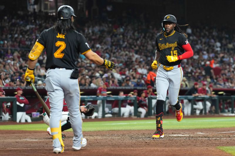 Jul 28, 2024; Phoenix, Arizona, USA; Pittsburgh Pirates shortstop Oneil Cruz (15) crosses home plate after hitting a solo home run against the Arizona Diamondbacks during the sixth inning at Chase Field. Mandatory Credit: Joe Camporeale-USA TODAY Sports