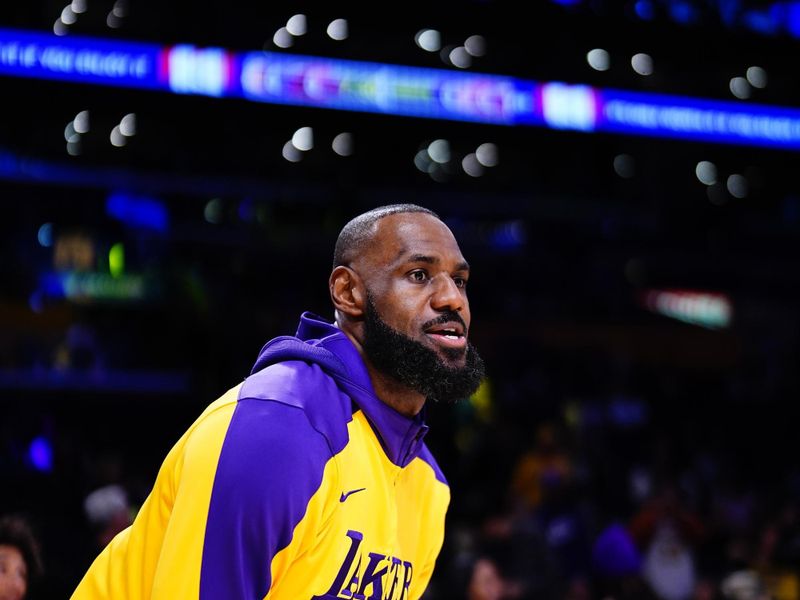 LOS ANGELES, CA - JANUARY 15: LeBron James #23 of the Los Angeles Lakers warms up before the game against the Miami Heat on January 15, 2025 at Crypto.Com Arena in Los Angeles, California. NOTE TO USER: User expressly acknowledges and agrees that, by downloading and/or using this Photograph, user is consenting to the terms and conditions of the Getty Images License Agreement. Mandatory Copyright Notice: Copyright 2025 NBAE (Photo by Tyler Ross/NBAE via Getty Images)