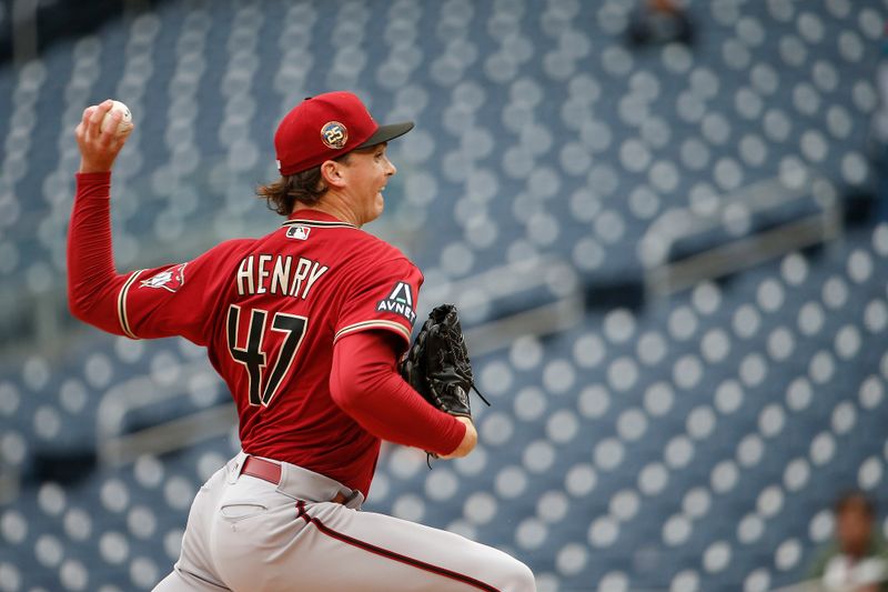 Jun 22, 2023; Washington, District of Columbia, USA; Arizona Diamondbacks starting pitcher Tommy Henry (47) throws the ball in the first inning against the Washington Nationals at Nationals Park. Mandatory Credit: Amber Searls-USA TODAY Sports