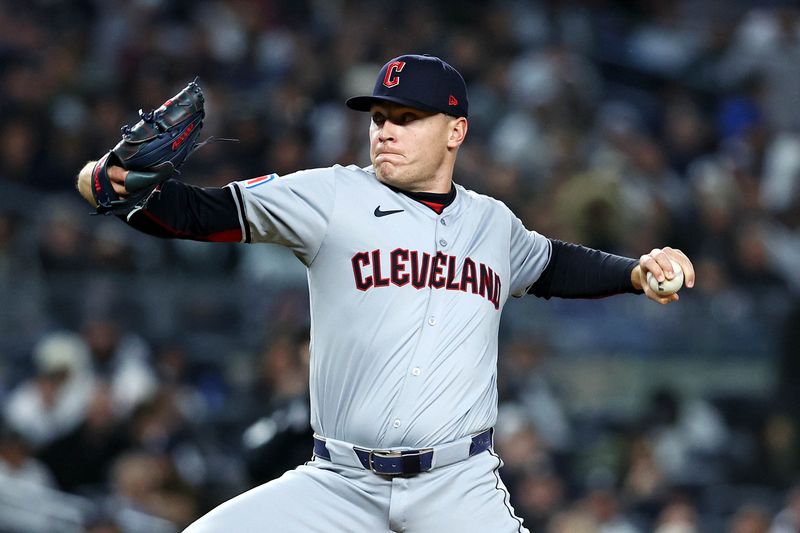 Oct 15, 2024; Bronx, New York, USA; Cleveland Guardians pitcher Erik Sabrowski (62) pitches during the sixth inning against the New York Yankees in game two of the ALCS for the 2024 MLB Playoffs at Yankee Stadium. Mandatory Credit: Wendell Cruz-Imagn Images