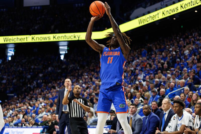 Jan 4, 2025; Lexington, Kentucky, USA; Florida Gators guard Denzel Aberdeen (11) shoots the ball during the first half against the Kentucky Wildcats at Rupp Arena at Central Bank Center. Mandatory Credit: Jordan Prather-Imagn Images