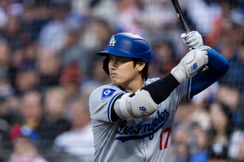 May 15, 2024; San Francisco, California, USA; Los Angeles Dodgers designated hitter Shohei Ohtani (17) on deck before batting against the San Francisco Giants during the fifth inning at Oracle Park. Mandatory Credit: John Hefti-USA TODAY Sports