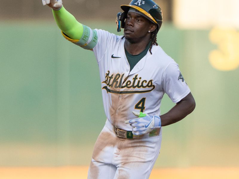 Jul 23, 2024; Oakland, California, USA;  Oakland Athletics outfielder Lawrence Butler (4) celebrates after hitting a solo home run during the third inning against the Houston Astros at Oakland-Alameda County Coliseum. Mandatory Credit: Stan Szeto-USA TODAY Sports