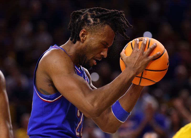 Mar 3, 2026; Tempe, Arizona, USA; Kansas Jayhawks guard Darryn Peterson (22) reacts against the Arizona State Sun Devils in the second half at Desert Financial Arena. Mandatory Credit: Mark J. Rebilas-Imagn Images