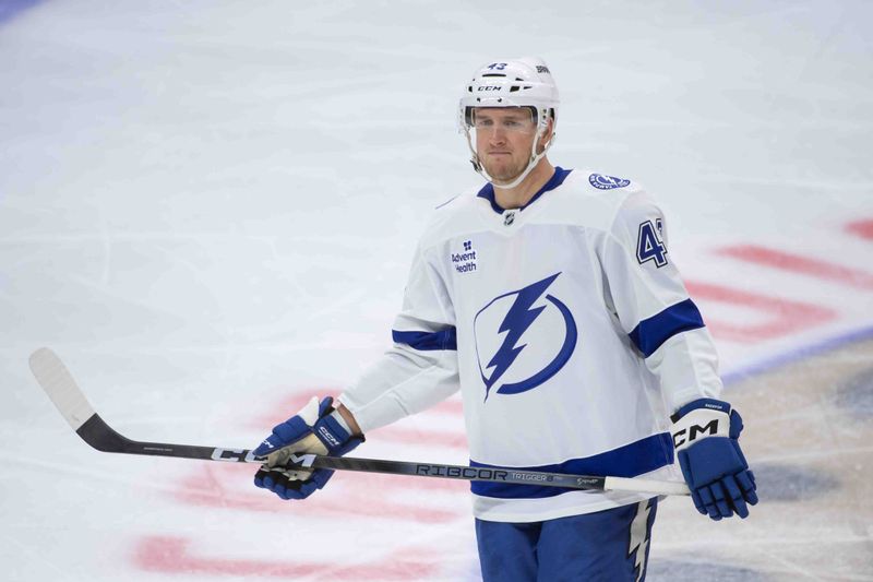 Oct 19, 2024; Ottawa, Ontario, CAN; Tampa Bay Lightning defenseman Darren Raddysh (43) skates in the third period against the Ottawa Senators at the Canadian Tire Centre. Mandatory Credit: Marc DesRosiers-Imagn Images