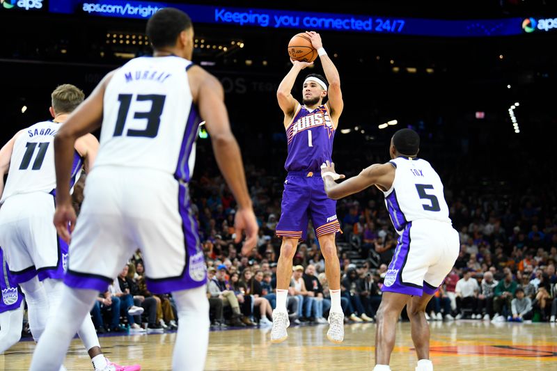 PHOENIX, ARIZONA - NOVEMBER 10: Devin Booker #1 of the Phoenix Suns takes a shot against the Sacramento Kings during the second half of the NBA game at Footprint Center on November 10, 2024 in Phoenix, Arizona. NOTE TO USER: User expressly acknowledges and agrees that, by downloading and/or using this photograph, user is consenting to the terms and conditions of the Getty Images License Agreement.  (Photo by Kelsey Grant/Getty Images)
