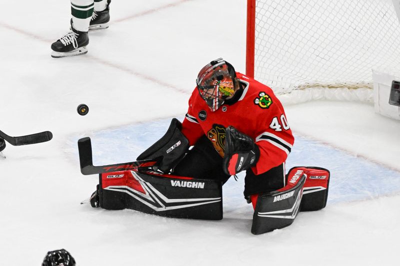 Apr 7, 2024; Chicago, Illinois, USA;  Chicago Blackhawks goaltender Arvid Soderblom (40) defends against the Minnes ota Wild during the first period at the United Center. Mandatory Credit: Matt Marton-USA TODAY Sports