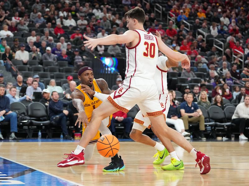 Mar 9, 2023; Las Vegas, NV, USA; Arizona State Sun Devils guard Luther Muhammad (1) sends a bounce pass under USC Trojans forward Harrison Hornery (30) during the first half at T-Mobile Arena. Mandatory Credit: Stephen R. Sylvanie-USA TODAY Sports