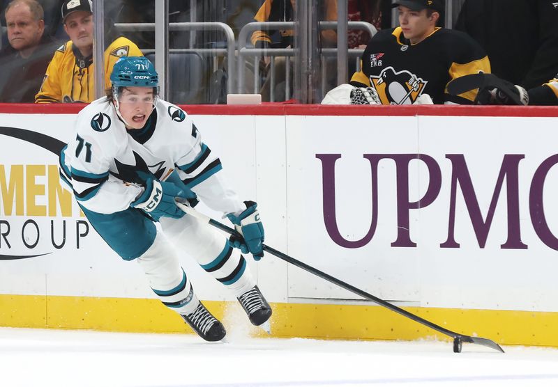 Dec 13, 2025; Pittsburgh, Pennsylvania, USA;  San Jose Sharks center Macklin Celebrini (71) skates with the puck against the Pittsburgh Penguins during the first period at PPG Paints Arena. Mandatory Credit: Charles LeClaire-Imagn Images