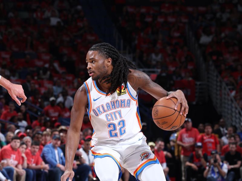 NEW ORLEANS, LA - APRIL 27: Cason Wallace #22 of the Oklahoma City Thunder  handles the ball during the game against the New Orleans Pelicans during Round 1 Game 3 of the 2024 NBA Playoffs on April 27, 2024 at the Smoothie King Center in New Orleans, Louisiana. NOTE TO USER: User expressly acknowledges and agrees that, by downloading and or using this Photograph, user is consenting to the terms and conditions of the Getty Images License Agreement. Mandatory Copyright Notice: Copyright 2024 NBAE (Photo by Jeff Haynes/NBAE via Getty Images)