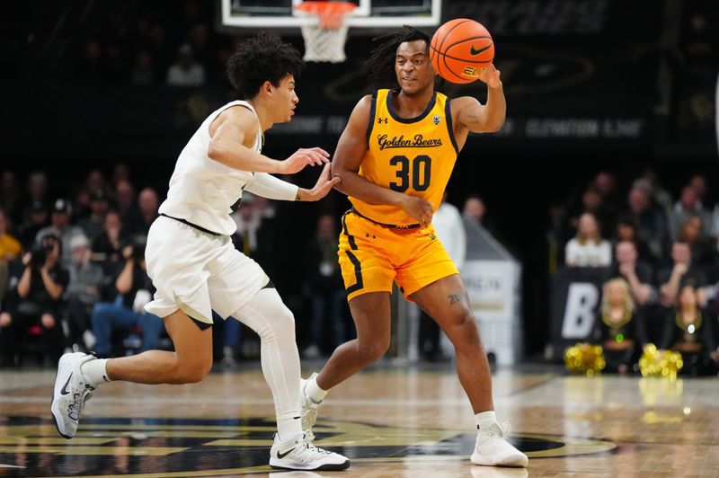 Feb 2, 2023; Boulder, Colorado, USA; California Golden Bears guard Wrenn Robinson (30) passes away from Colorado Buffaloes guard KJ Simpson (2) in the second half at the CU Events Center. Mandatory Credit: Ron Chenoy-USA TODAY Sports