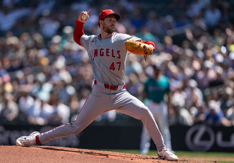 Jul 24, 2024; Seattle, Washington, USA;  Los Angeles Angels starter Griffin Canning (47) delivers a pitch during the second inning against the Seattle Mariners at T-Mobile Park. Mandatory Credit: Stephen Brashear-USA TODAY Sports