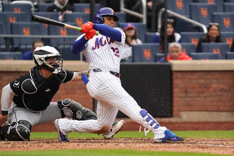 May 28, 2025; New York, New York, USA; New York Mets right fielder Juan Soto (22) grounds out during the game against the Chicago White Sox at Citi Field. Mandatory Credit: Lucas Boland-Imagn Images