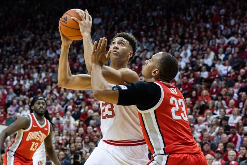 Jan 28, 2023; Bloomington, Indiana, USA; Indiana Hoosiers forward Trayce Jackson-Davis (23) shoots the ball while Ohio State Buckeyes forward Zed Key (23) defends in the first half at Simon Skjodt Assembly Hall. Mandatory Credit: Trevor Ruszkowski-USA TODAY Sports