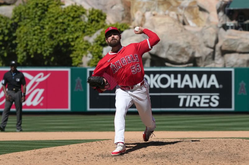 Apr 10, 2024; Anaheim, California, USA; Los Angeles Angels pitcher Matt Moore (55) throws in the eighth inning against the Tampa Bay Rays at Angel Stadium. Mandatory Credit: Kirby Lee-USA TODAY Sports