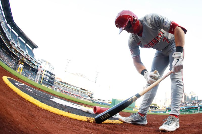 Aug 22, 2024; Pittsburgh, Pennsylvania, USA;  Cincinnati Reds left fielder Spencer Steer (7) prepares in the on-deck circle before batting against the Pittsburgh Pirates during the fourth inning at PNC Park. Mandatory Credit: Charles LeClaire-USA TODAY Sports