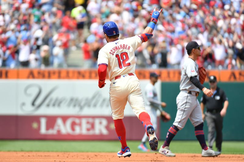 Jul 28, 2024; Philadelphia, Pennsylvania, USA; Philadelphia Phillies designated hitter Kyle Schwarber (12) runs the bases after hitting a home run against the Cleveland Guardians during the first inning at Citizens Bank Park. Mandatory Credit: Eric Hartline-USA TODAY Sports