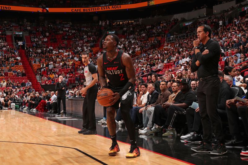 MIAMI, FL - MARCH 13: Terry Rozier #2 of the Miami Heat shoots a three point basket during the game against the Denver Nuggets on March 13, 2024 at Kaseya Center in Miami, Florida. NOTE TO USER: User expressly acknowledges and agrees that, by downloading and or using this Photograph, user is consenting to the terms and conditions of the Getty Images License Agreement. Mandatory Copyright Notice: Copyright 2024 NBAE (Photo by Issac Baldizon/NBAE via Getty Images)