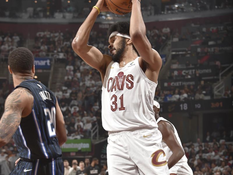 CLEVELAND, OH - APRIL 22: Jarrett Allen #31 of the Cleveland Cavaliers grabs the rebound during the game against the Orlando Magic during Round 1 Game 2 of the 2024 NBA Playoffs on April 22, 2024 at Rocket Mortgage FieldHouse in Cleveland, Ohio. NOTE TO USER: User expressly acknowledges and agrees that, by downloading and/or using this Photograph, user is consenting to the terms and conditions of the Getty Images License Agreement. Mandatory Copyright Notice: Copyright 2024 NBAE (Photo by David Liam Kyle/NBAE via Getty Images)