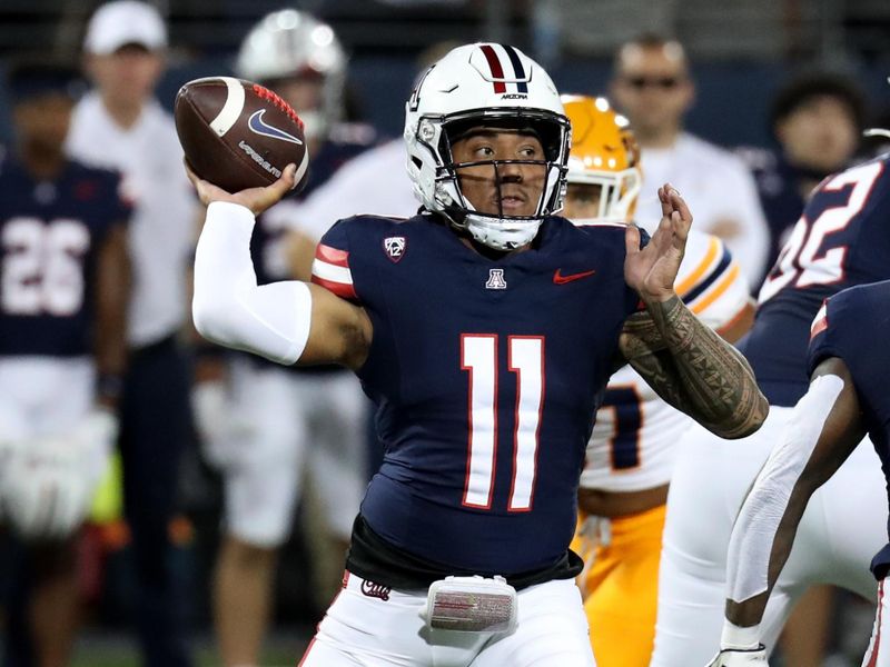 Sep 16, 2023; Tucson, Arizona, USA; Arizona Wildcats quarterback Noah Fifita (11) makes a pass against the UTEP Miners during the second half at Arizona Stadium. Mandatory Credit: Zachary BonDurant-USA TODAY Sports