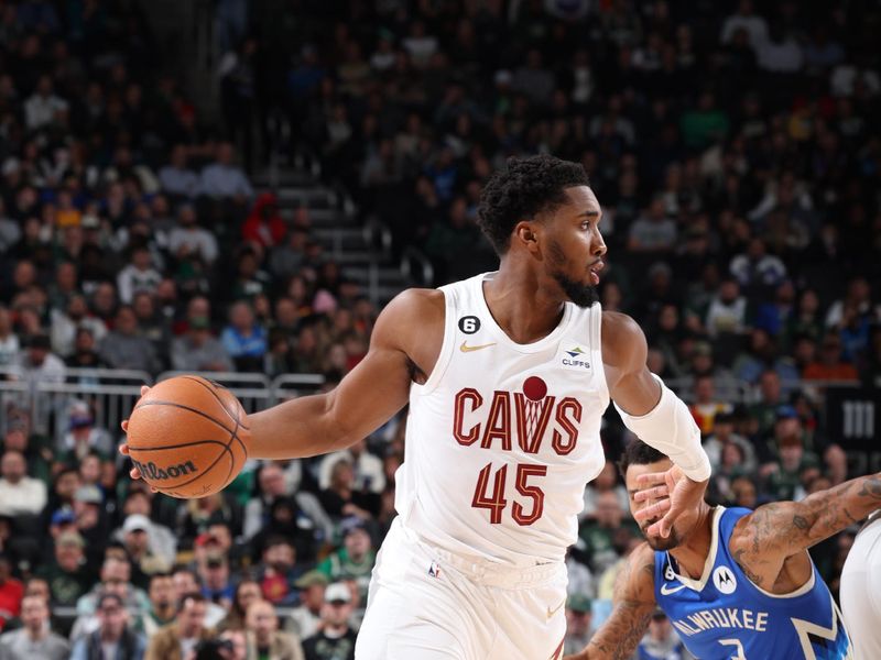 MILWAUKEE, WI - NOVEMBER 16: Donovan Mitchell #45 of the Cleveland Cavaliers dribbles the ball during the game against the Milwaukee Bucks on November 16, 2022 at the Fiserv Forum Center in Milwaukee, Wisconsin. NOTE TO USER: User expressly acknowledges and agrees that, by downloading and or using this Photograph, user is consenting to the terms and conditions of the Getty Images License Agreement. Mandatory Copyright Notice: Copyright 2022 NBAE (Photo by Jeff Haynes/NBAE via Getty Images).