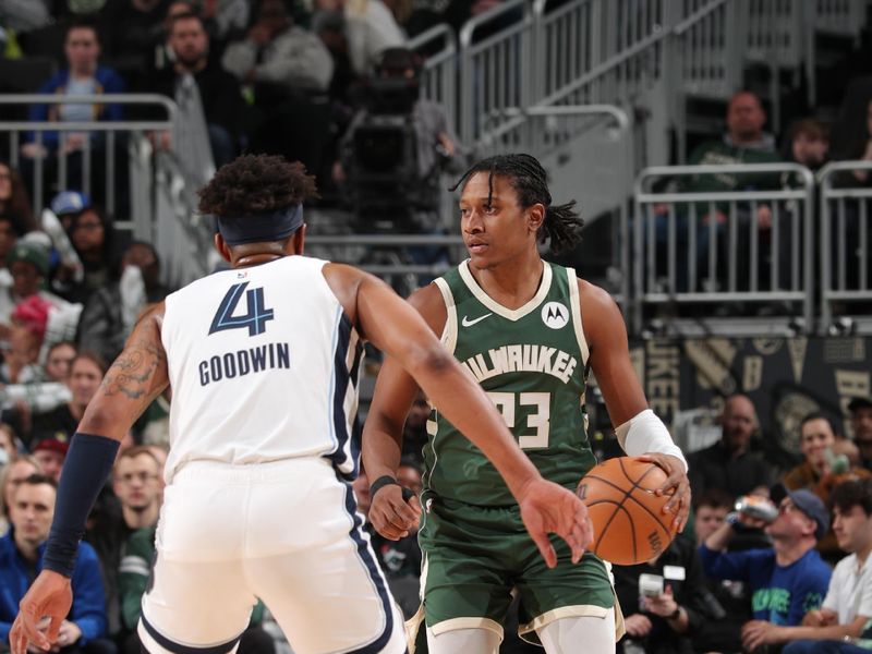 MILWAUKEE, WI - APRIL 3: TyTy Washington Jr. #23 of the Milwaukee Bucks  dribbles the ball during the game against the Memphis Grizzlies on April 3, 2024 at the Fiserv Forum Center in Milwaukee, Wisconsin. NOTE TO USER: User expressly acknowledges and agrees that, by downloading and or using this Photograph, user is consenting to the terms and conditions of the Getty Images License Agreement. Mandatory Copyright Notice: Copyright 2024 NBAE (Photo by Gary Dineen/NBAE via Getty Images).