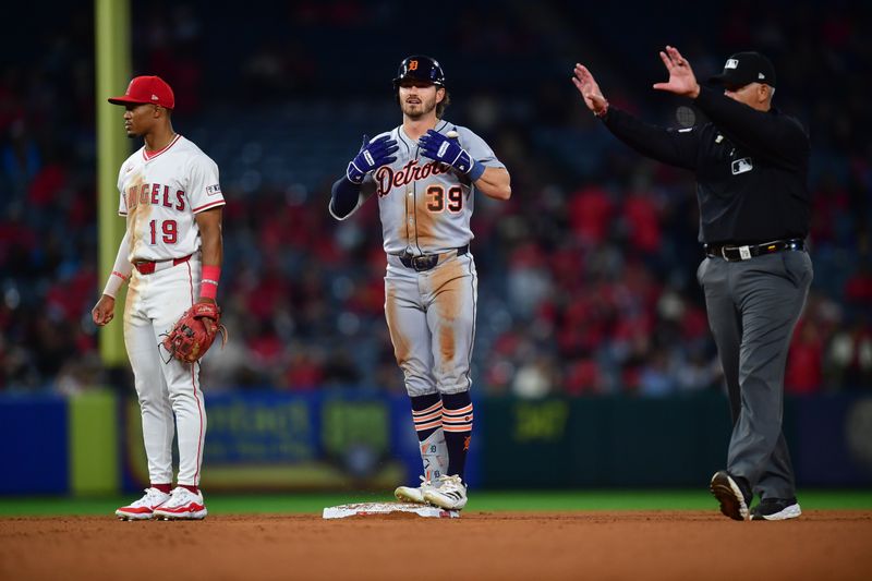 May 1, 2025; Anaheim, California, USA; Detroit Tigers left fielder Zach McKinstry (39) reaches second after hitting an RBI single against the Los Angeles Angels during the eighth inning at Angel Stadium. Mandatory Credit: Gary A. Vasquez-Imagn Images