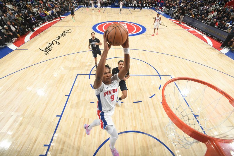 DETROIT, MI - JANUARY 1: Ausar Thompson #9 of the Detroit Pistons drives to the basket during the game against the Orlando Magic on January 1, 2025 at Little Caesars Arena in Detroit, Michigan. NOTE TO USER: User expressly acknowledges and agrees that, by downloading and/or using this photograph, User is consenting to the terms and conditions of the Getty Images License Agreement. Mandatory Copyright Notice: Copyright 2025 NBAE (Photo by Chris Schwegler/NBAE via Getty Images)