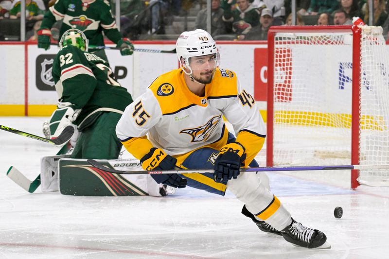 Jan 25, 2024; Saint Paul, Minnesota, USA; Nashville Predators defenseman Alexandre Carrier (45) celebrates his goal against the Minnesota Wild during the third period at Xcel Energy Center. Mandatory Credit: Nick Wosika-USA TODAY Sports