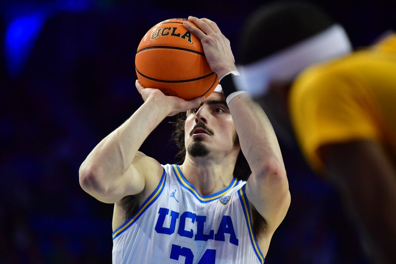 Mar 2, 2023; Los Angeles, California, USA; UCLA Bruins guard Jaime Jaquez Jr. (24) shoots a free throw against the Arizona State Sun Devils during the second half at Pauley Pavilion. Mandatory Credit: Gary A. Vasquez-USA TODAY Sports