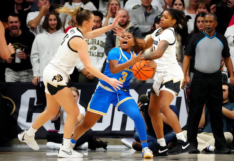 Jan 19, 2024; Boulder, Colorado, USA; Colorado Buffaloes guard Kindyll Wetta (15) and guard Tameiya Sadler (2) defend on UCLA Bruins guard Londynn Jones (3)  in the second half at the CU Events Center. Mandatory Credit: Ron Chenoy-USA TODAY Sports
\v11