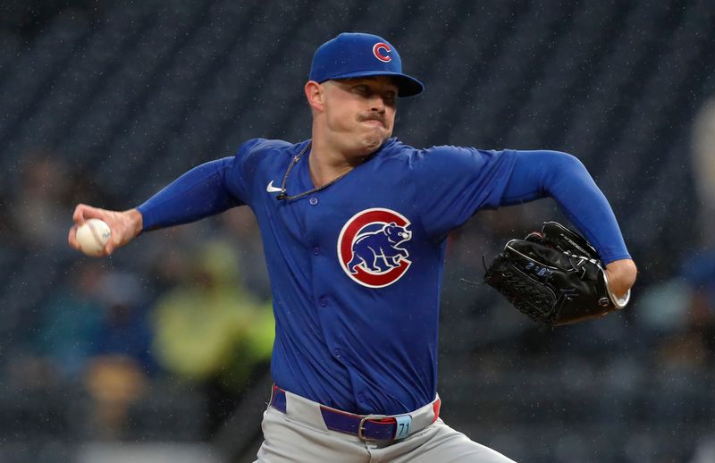 May 11, 2024; Pittsburgh, Pennsylvania, USA; Chicago Cubs relief pitcher Keegan Thompson (71) throws against the Pittsburgh Pirates during the fifth inning at PNC Park. Mandatory Credit: Charles LeClaire-USA TODAY Sports