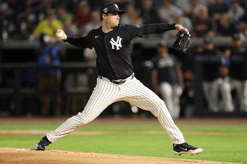 Mar 1, 2024; Tampa, Florida, USA;  New York Yankees starting pitcher Gerrit Cole (45) throws a pitch against the Toronto Blue Jays in the first inning at George M. Steinbrenner Field. Mandatory Credit: Nathan Ray Seebeck-USA TODAY Sports