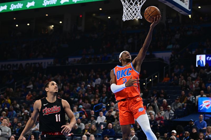 OKLAHOMA CITY, OKLAHOMA - JANUARY 23: Shai Gilgeous-Alexander #2 of the Oklahoma City Thunder goes up for a layup during the first half against the Portland Trail Blazers at Paycom Center on January 23, 2024 in Oklahoma City, Oklahoma. NOTE TO USER: User expressly acknowledges and agrees that, by downloading and or using this Photograph, user is consenting to the terms and conditions of the Getty Images License Agreement. (Photo by Joshua Gateley/Getty Images)