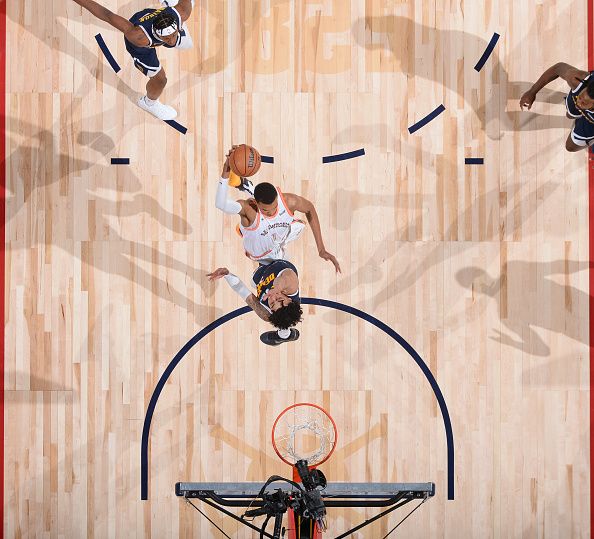 DENVER, CO - NOVEMBER 26: Victor Wembanyama #1 of the San Antonio Spurs drives to the basket during the game against the Denver Nuggets on November 26, 2023 at the Ball Arena in Denver, Colorado. NOTE TO USER: User expressly acknowledges and agrees that, by downloading and/or using this Photograph, user is consenting to the terms and conditions of the Getty Images License Agreement. Mandatory Copyright Notice: Copyright 2023 NBAE (Photo by Bart Young/NBAE via Getty Images)