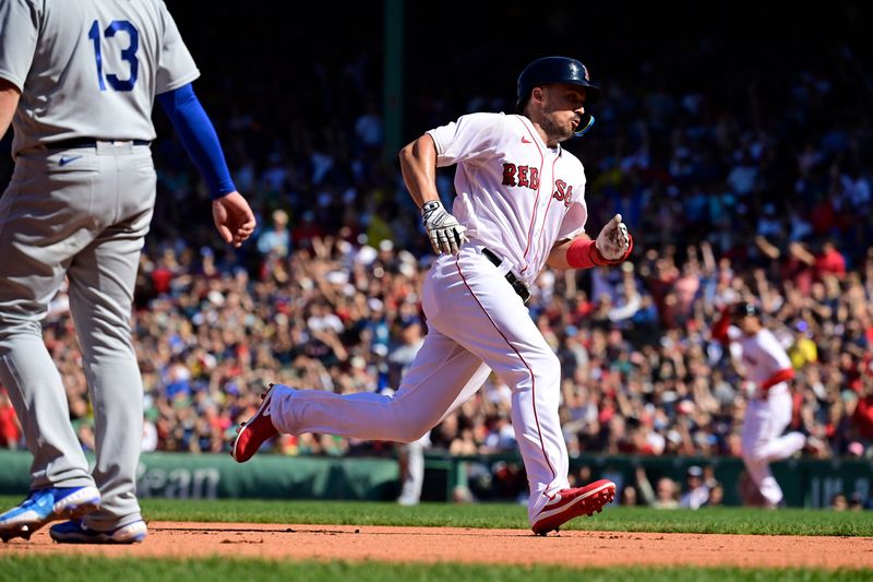 Aug 27, 2023; Boston, Massachusetts, USA; Boston Red Sox left fielder Adam Duvall (18) runs home on a two-run home run by first baseman Triston Casas (36) during the sixth inning against the Los Angeles Dodgers at Fenway Park. Mandatory Credit: Eric Canha-USA TODAY Sports