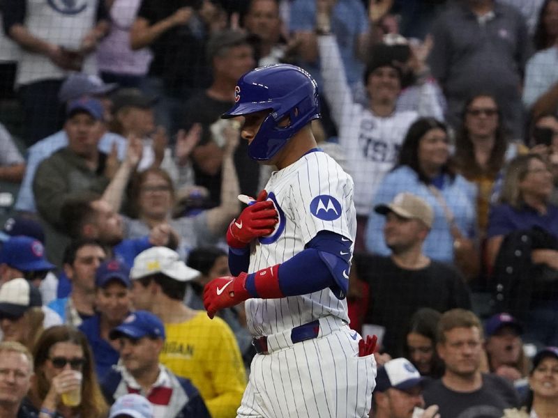 Sep 22, 2024; Chicago, Illinois, USA; Chicago Cubs catcher Miguel Amaya (9) gestures after hitting a two-run home run against the Washington Nationals during the fourth inning at Wrigley Field. Mandatory Credit: David Banks-Imagn Images