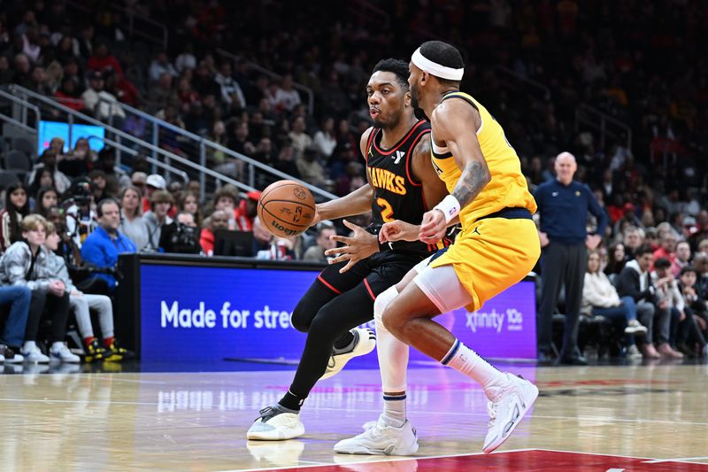 ATLANTA, GA - JANUARY 12: Trent Forrest #2 of the Atlanta Hawks dribbles the ball during the game against the Indiana Pacers on January 12, 2024 at State Farm Arena in Atlanta, Georgia.  NOTE TO USER: User expressly acknowledges and agrees that, by downloading and/or using this Photograph, user is consenting to the terms and conditions of the Getty Images License Agreement. Mandatory Copyright Notice: Copyright 2024 NBAE (Photo by Adam Hagy/NBAE via Getty Images)