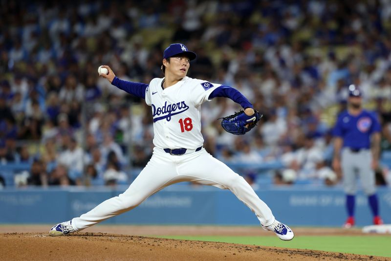 Sep 10, 2024; Los Angeles, California, USA;  Los Angeles Dodgers starting pitcher Yoshinobu Yamamoto (18) pitches during the third inning against the Chicago Cubs at Dodger Stadium. Mandatory Credit: Kiyoshi Mio-Imagn Images