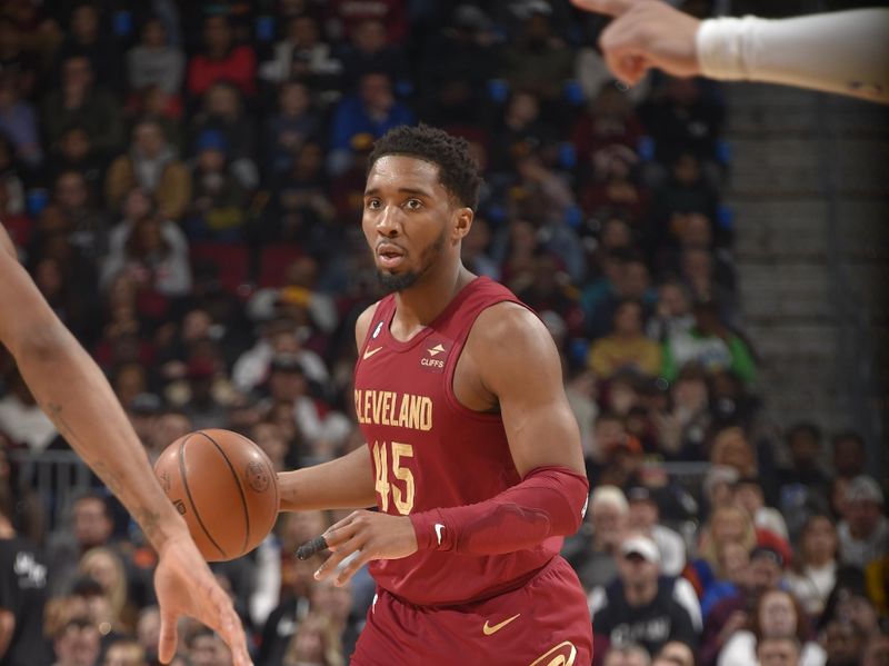 CLEVELAND, OH - APRIL 2:  Donovan Mitchell #45 of the Cleveland Cavaliers goes to the basket during the game on April 2, 2023 at Rocket Mortgage FieldHouse in Cleveland, Ohio. NOTE TO USER: User expressly acknowledges and agrees that, by downloading and/or using this Photograph, user is consenting to the terms and conditions of the Getty Images License Agreement. Mandatory Copyright Notice: Copyright 2023 NBAE (Photo by David Liam Kyle/NBAE via Getty Images)