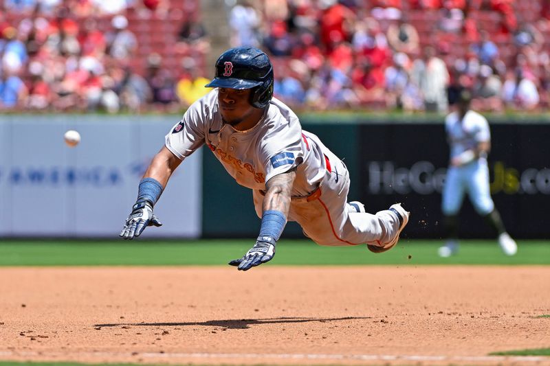 May 19, 2024; St. Louis, Missouri, USA;  Boston Red Sox center fielder Ceddanne Rafaela (43) dives as he slides in at third base against the St. Louis Cardinals during the fourth inning at Busch Stadium. Mandatory Credit: Jeff Curry-USA TODAY Sports