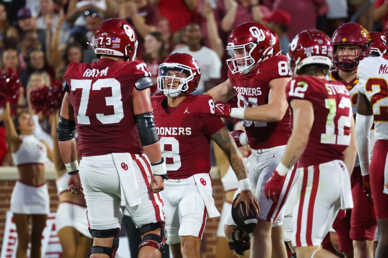 Sep 30, 2023; Norman, Oklahoma, USA;  Oklahoma Sooners quarterback Dillon Gabriel (8) celebrates with teammates after scoring a touchdown during the first half against the Iowa State Cyclones at Gaylord Family-Oklahoma Memorial Stadium. Mandatory Credit: Kevin Jairaj-USA TODAY Sports