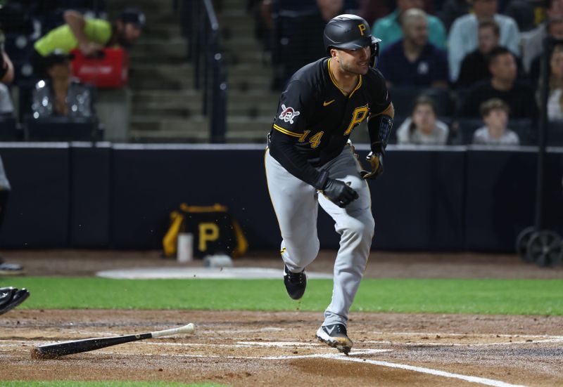 Mar 3, 2025; Tampa, Florida, USA;  Pittsburgh Pirates catcher Joey Bart (14) singles during the second inning against the New York Yankees at George M. Steinbrenner Field. Mandatory Credit: Kim Klement Neitzel-Imagn Images