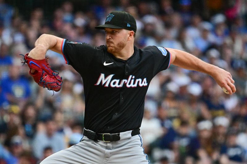 Jul 26, 2024; Milwaukee, Wisconsin, USA;  Miami Marlins starting pitcher Trevor Rogers (28) pitches in the first inning against the Milwaukee Brewers at American Family Field. Mandatory Credit: Benny Sieu-USA TODAY Sports